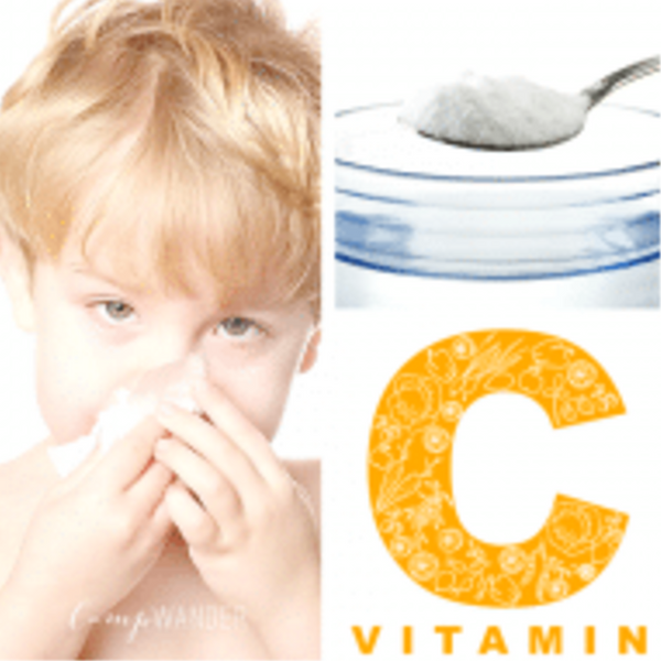 Child with cold and ascorbic acid vitamin C.