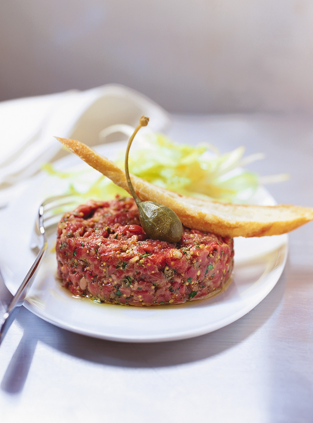 Beautiful and whimsical steak tartare presentation.