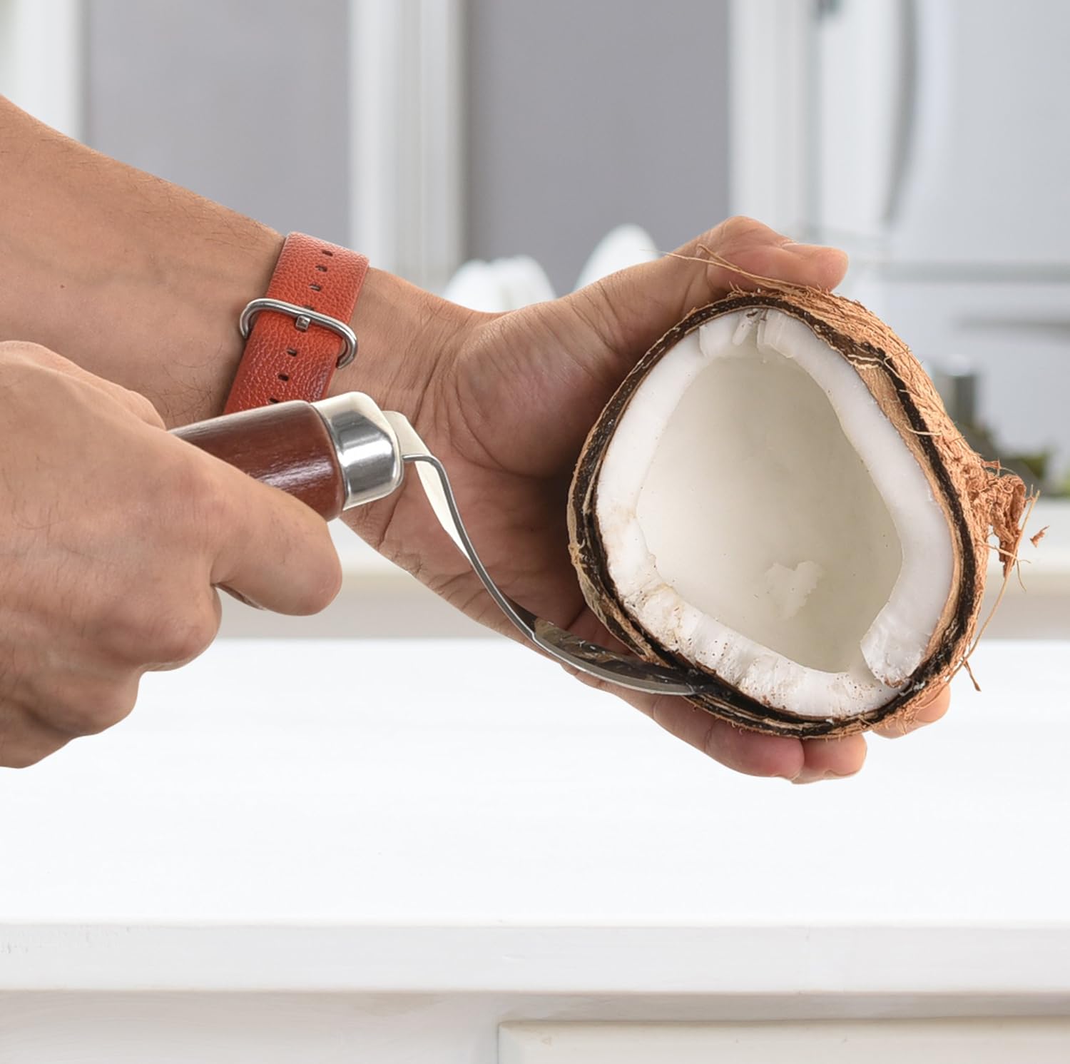 Removing coconut meat with the right tool makes this job much easier.