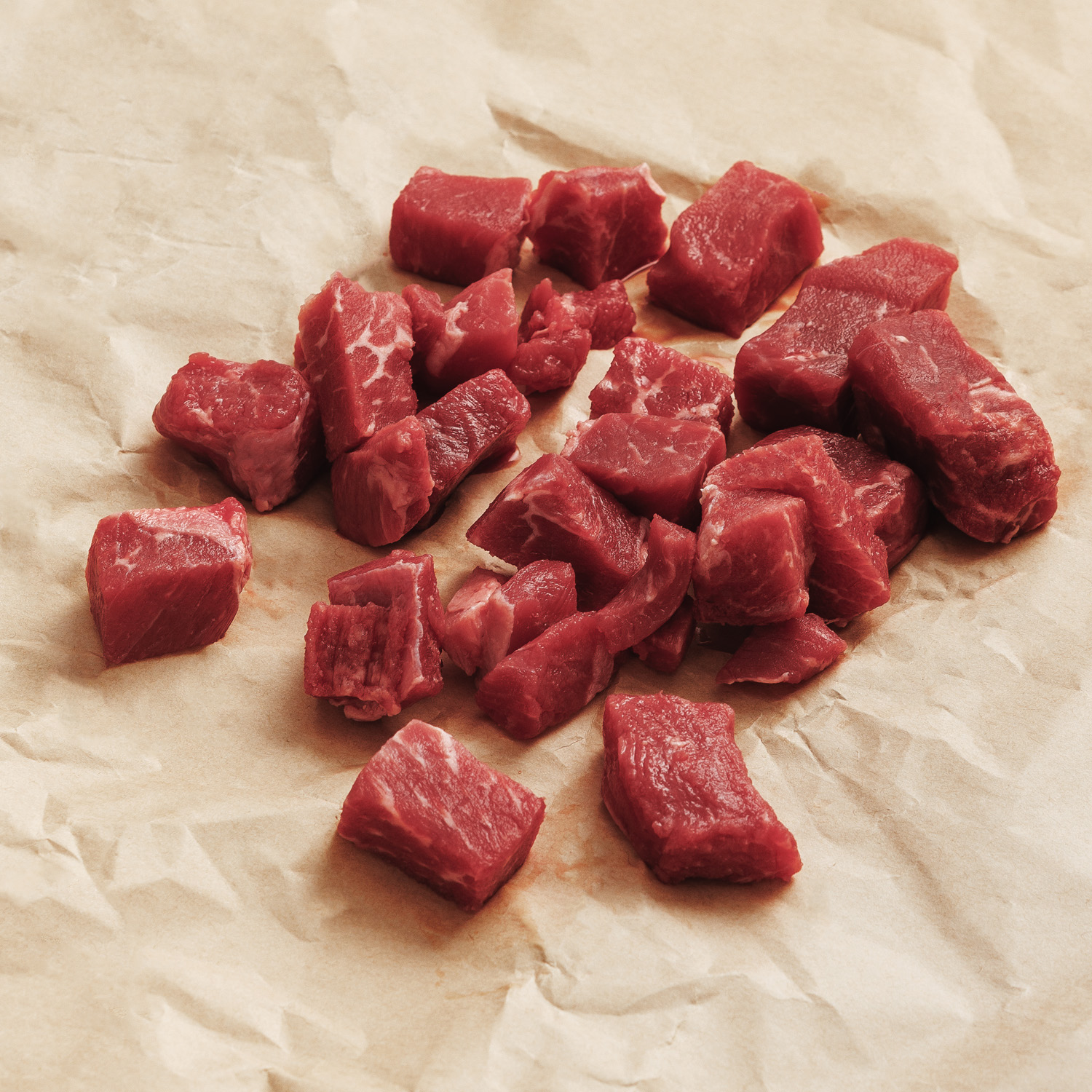 Bite-sized pieces of raw meat. Bite-sized pieces of raw meat.