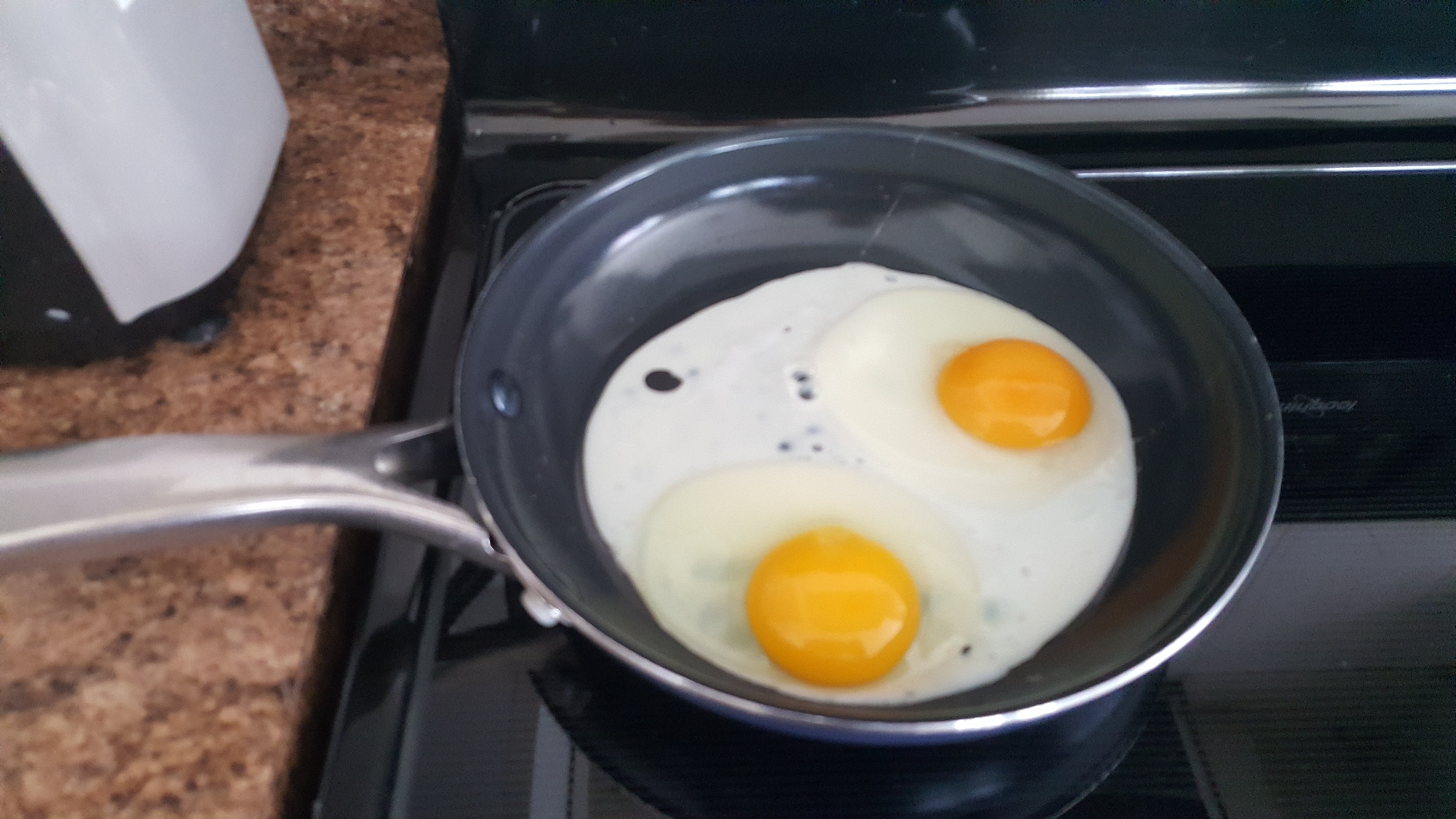 Denaturation and coagulation of egg whites.