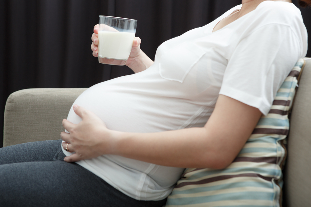 Drinking milk during pregnancy.