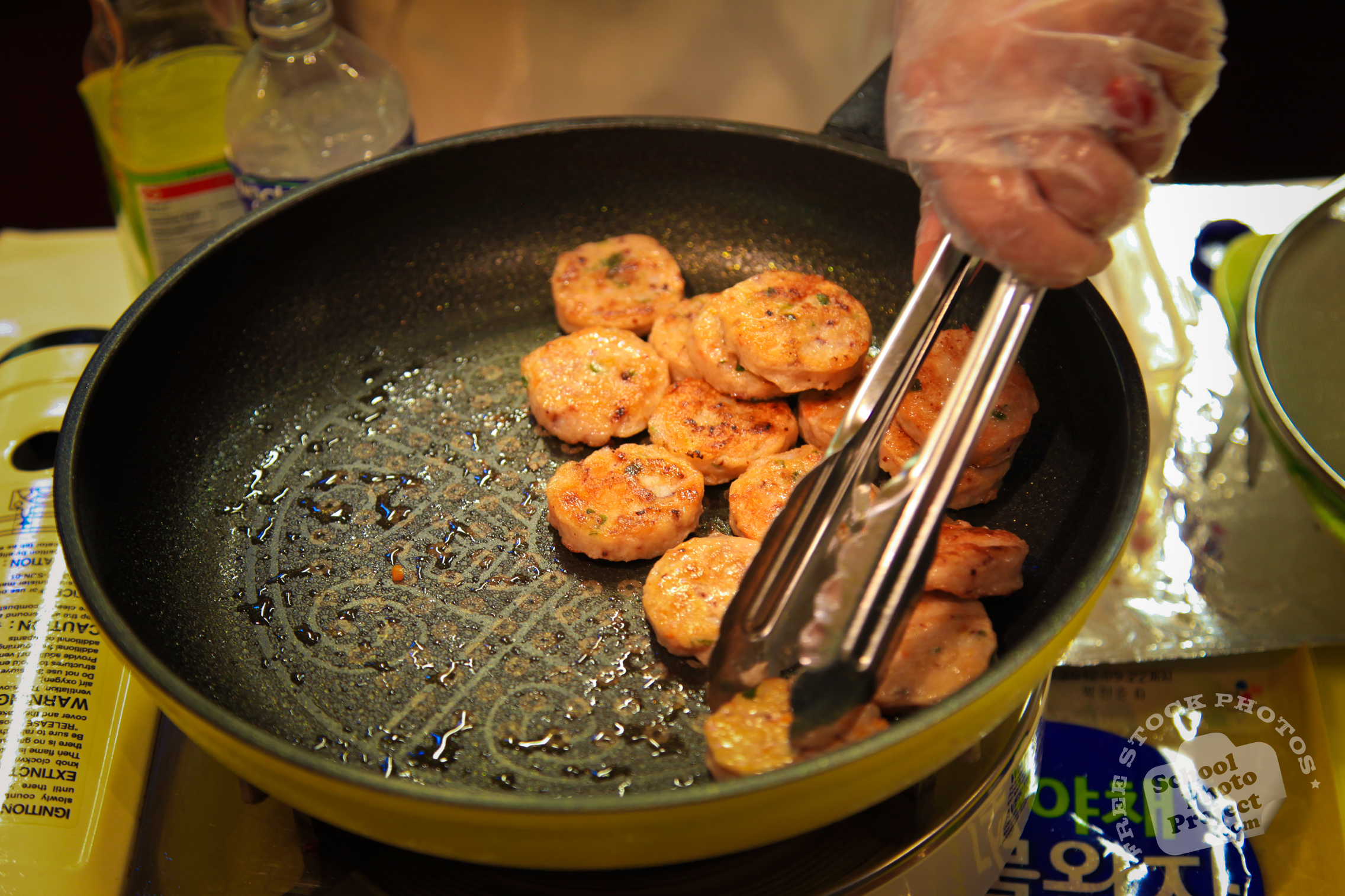 Pan frying seafood.