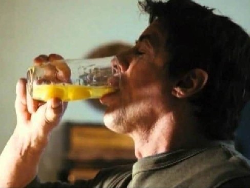 Man drinking raw eggs.