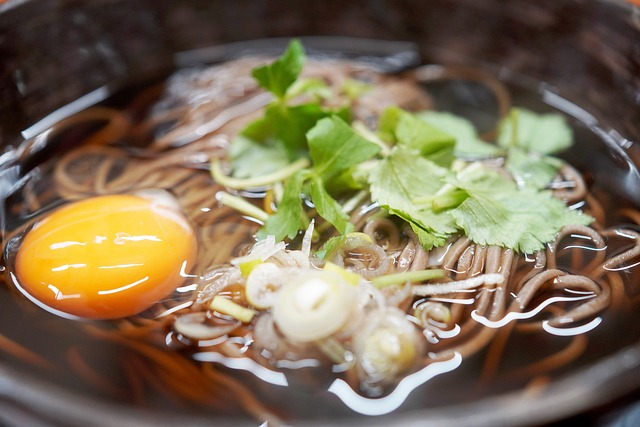 Asian soup with raw egg.