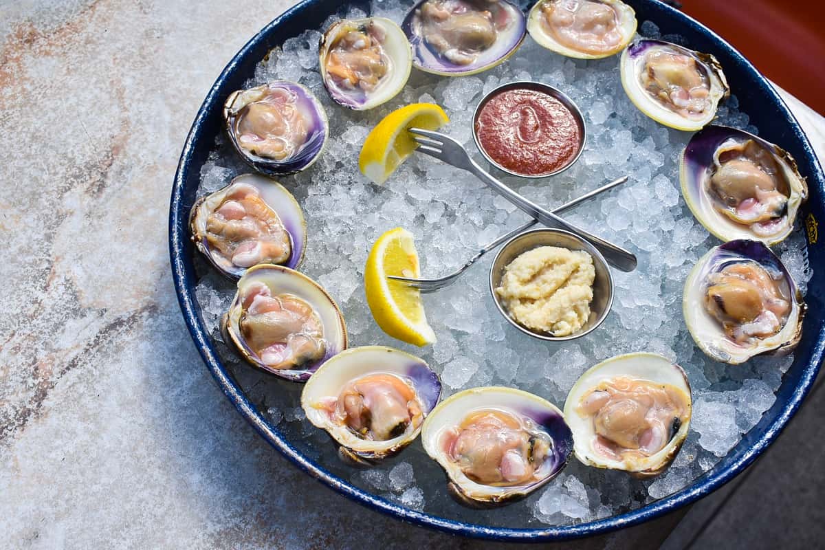 Raw top necked clams are a source of calcium and fat soluble vitamins.