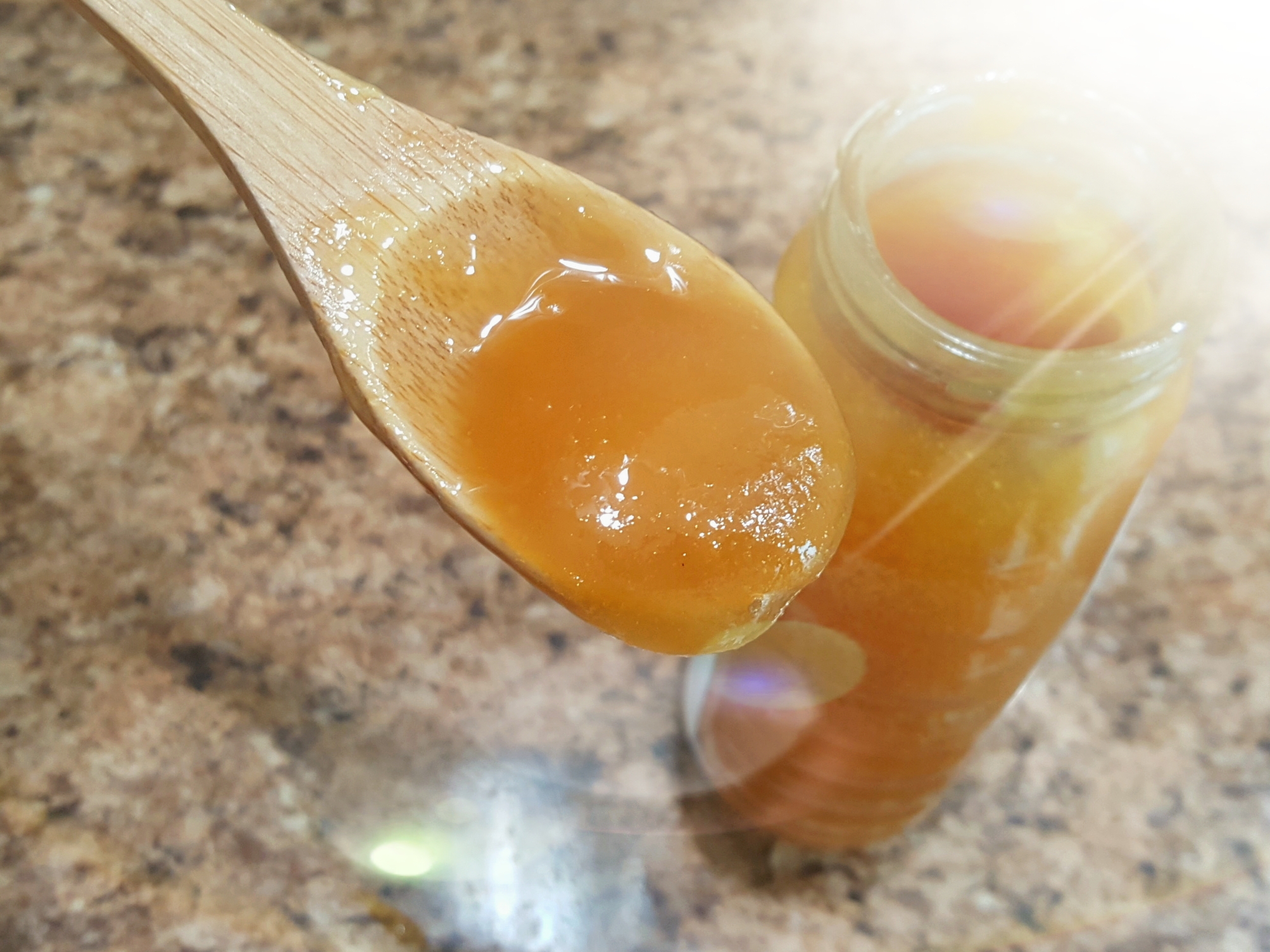 raw honey on spoon raw honey on spoon