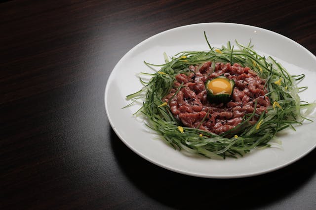 Korean yukhoe is made from raw meat.
